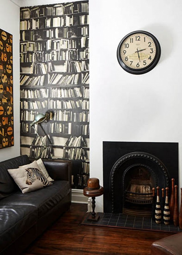 Wallpaper used as accent wall with book pattern