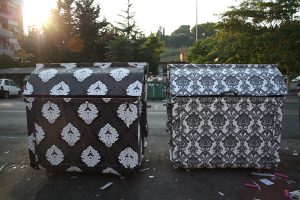 City dumpsters made pretty with wallpaper