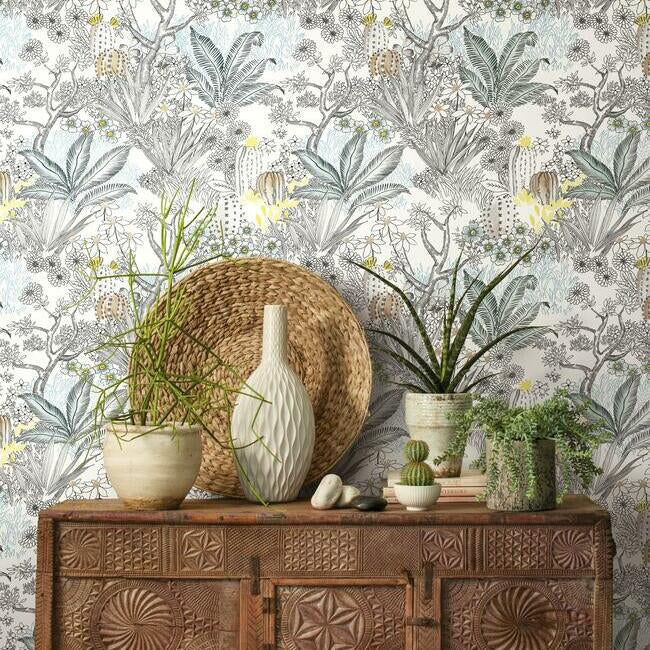 Floral and desert scenic wallpaper with pops of yellow. 