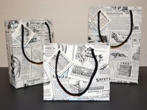 Vintage newspaper ad Wallpaper used as gift bags!